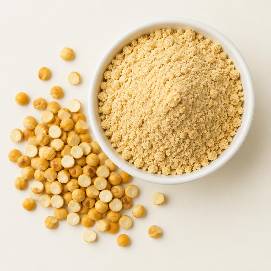 Pale golden roasted chana dal podi powder with chana dal beside